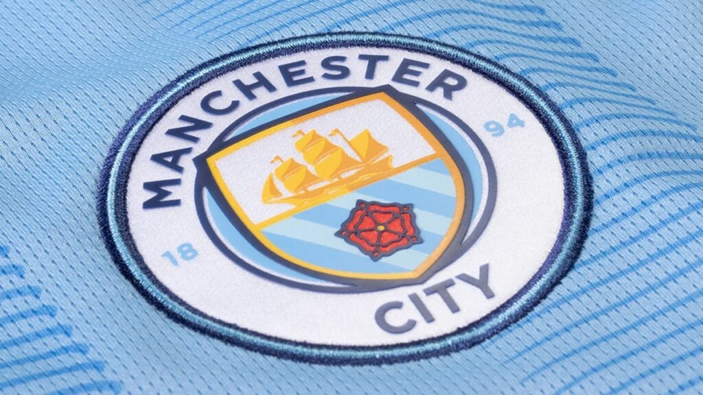 Assistir jogo do Manchester City online nesta quarta (24/09/2025) Escudo do Manchester City